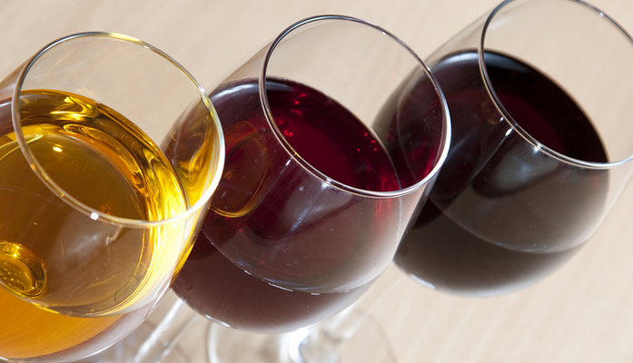 three glasses with wine